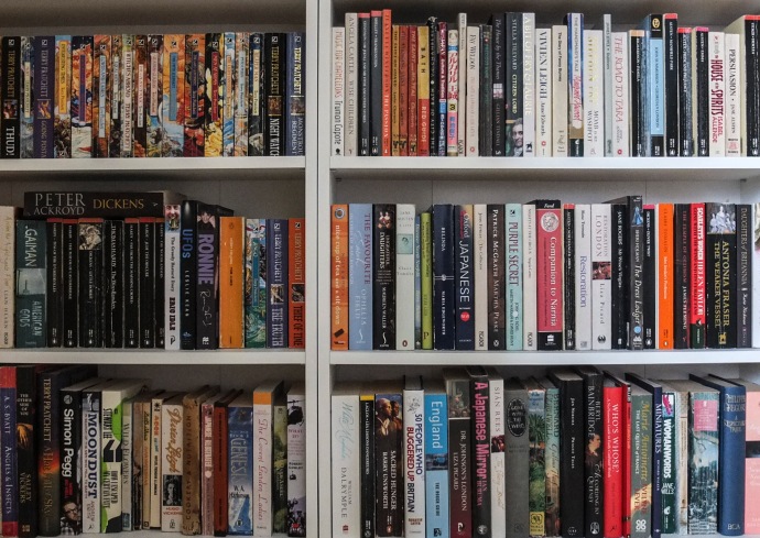 shelves with books on